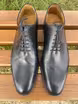 /bilder/schuh-dokumentation/oxfords/wholecut-oxfords-aus-schwarzem-glattleder/sub/wholecut-oxfords-aus-schwarzem-glattleder-oben.avif
